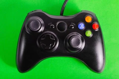 Wired modern game pad controller. Stock Photos