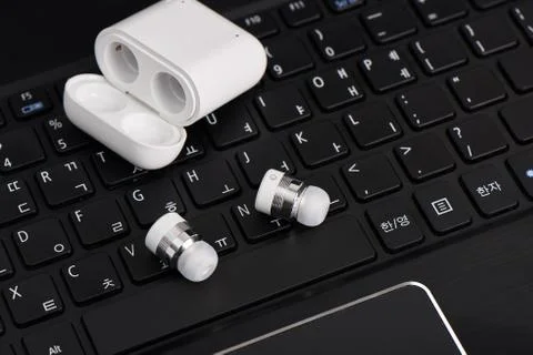Wireless bluetooth earbuds Stock Photos
