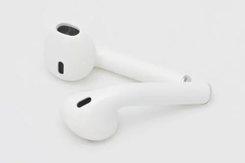 Wireless Bluetooth Earphone or Earbud or Headphone, Isolated on White Stock Photos