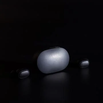 Wireless bluetooth headphones. Wireless technology. Stock Photos
