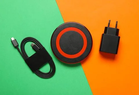Wireless charger, USB type-c cable, and power adapter for modern electronic d Stock Photos