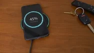 Wireless Charging A Smart Phone Battery Stock Footage