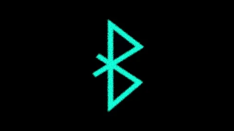 Wireless communication depicted by animated teal bluetooth icon graphic. Te.. Stock Footage 313428071