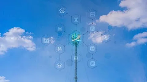 Wireless communication tower with digital icons in sky Stock Photos