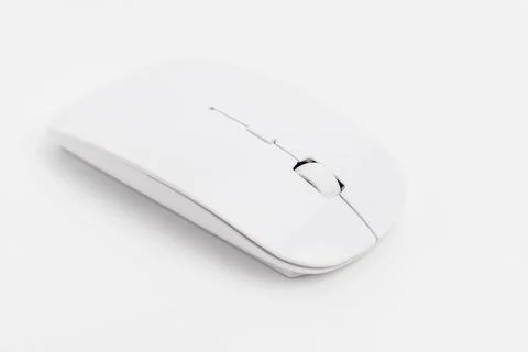 Wireless computer mouse on plain background sits quietly Stock Photos