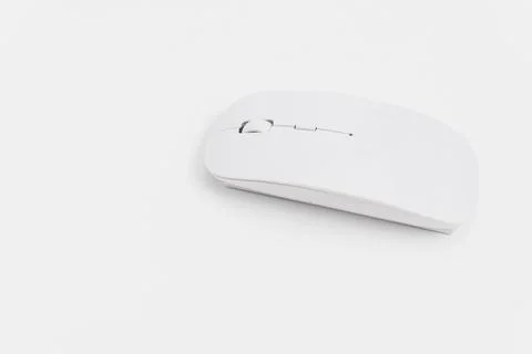 Wireless computer mouse on a plain background for office use Stock Photos