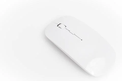 Wireless computer mouse on a plain white surface for office use Stock Photos