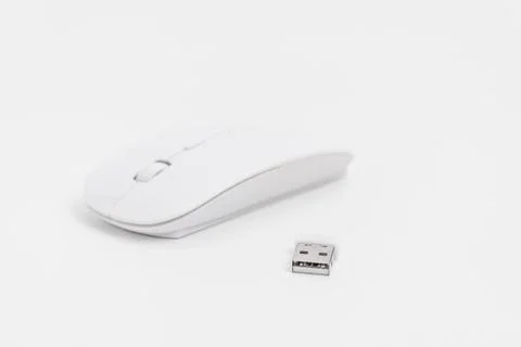 Wireless computer mouse with USB receiver on a white background Stock Photos