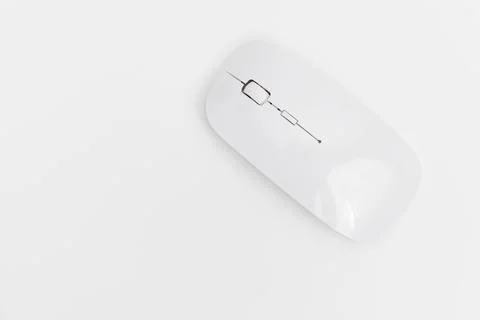 Wireless computer mouse on white background with simple design Stock Photos