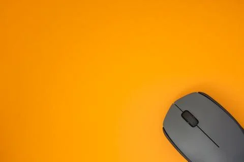 Wireless Computer Mouse On Yellow Background Stock Photos