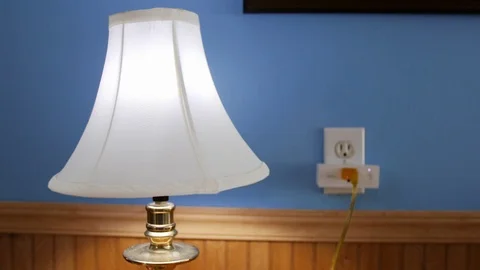 Wireless Control of Lamp with Smart Plug Outlet Stock Footage 104005024