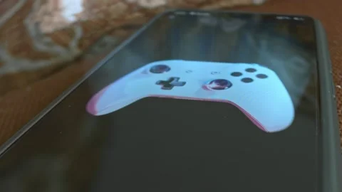 Wireless Controller Switch themed graphic presentation on smartphone Stock Footage 303426078