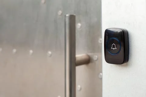 Wireless Doorbell Mounted on Brick Wall Foto stock