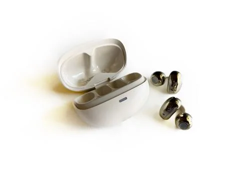 Wireless earbuds with charging case Stock Photos