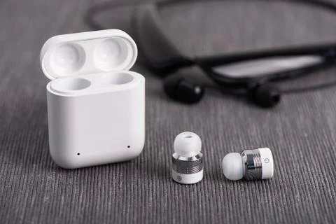 Wireless earbuds Stock Photos