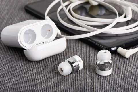 Wireless earbuds Stock Photos