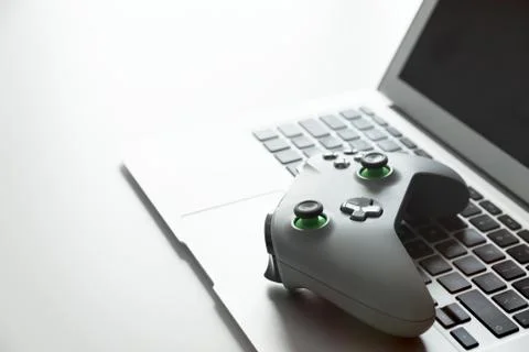 Wireless game pad controller on laptop keyboard 스톡 사진