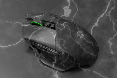 Wireless gaming computer mouse with black marble texture on dark background Stock Illustration