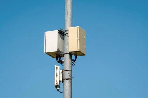 Wireless internet access point antenna on a metal pole Stock Photos