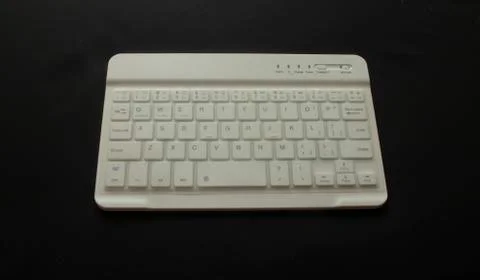 Wireless keyboard and mouse with clipping path. White keyboard with white mou Stock Photos