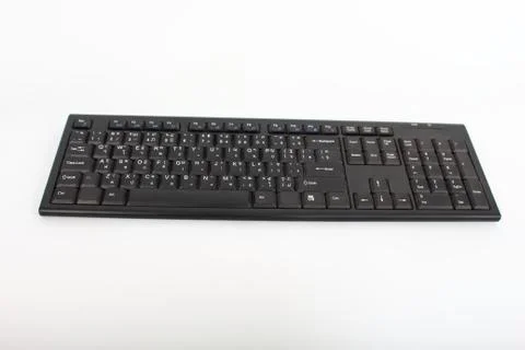 Wireless Keyboard black on a white background. Fotos Stock