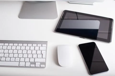 Wireless keyboard, mouse, tablet and smartphone Stock Photos
