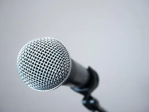 Wireless microphone on stand in studio on white background 库存照片