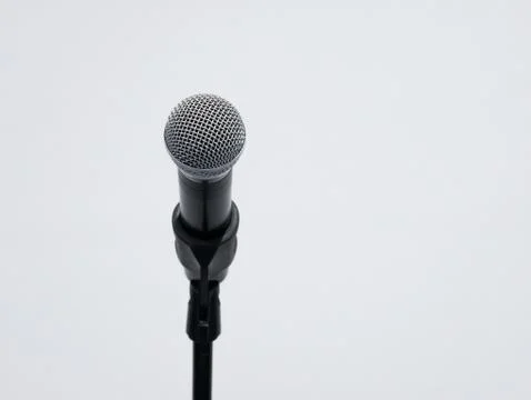 Wireless microphone on stand at white background 库存照片