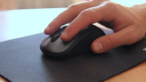 Wireless mouse on the computer mat Stock Footage 96708533