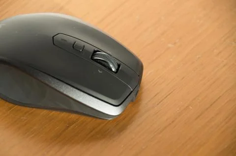 Wireless Mouse Isolated and Focused on a Table Stock Photos