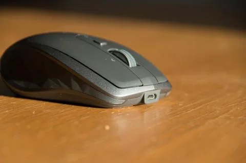 Wireless Mouse Isolated and Focused on a Table Stock Photos