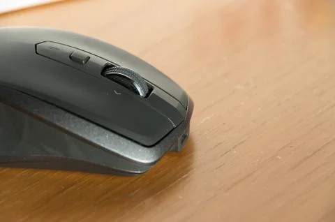 Wireless Mouse Isolated and Focused on a Table Stock Photos