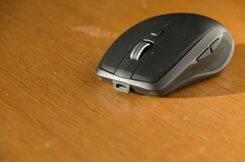 Wireless Mouse Isolated and Focused on a Table Stock Photos