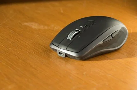 Wireless Mouse Isolated and Focused on a Table Stock Photos