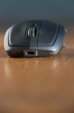 Wireless Mouse Isolated and Focused on a Table Stock Photos