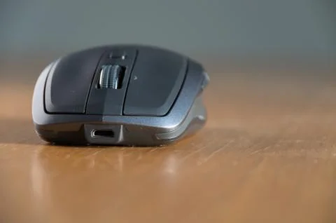 Wireless Mouse Isolated and Focused on a Table Stock Photos