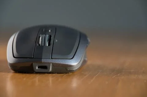 Wireless Mouse Isolated and Focused on a Table Stock Photos