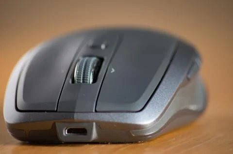 Wireless Mouse Isolated and Focused on a Table Stock Photos