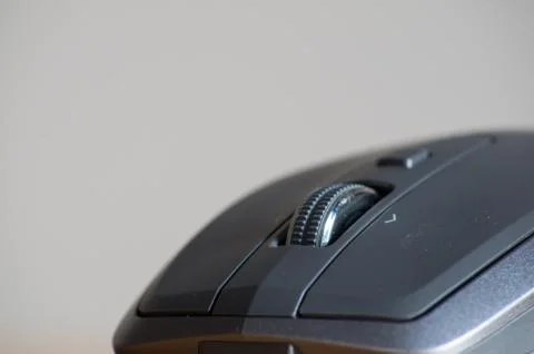 Wireless Mouse Isolated and Focused on a Table Foto stock