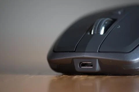Wireless Mouse Isolated and Focused on a Table Stock Photos