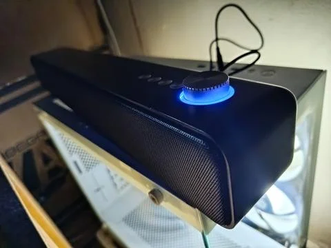 Wireless Music Speaker on Computer Case with Blue LED Light Modern Stock Photos
