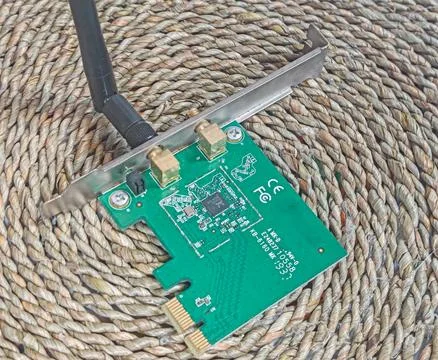 Wireless Network Adapter Circuit Board with Antenna on Natural Background Stock Photos