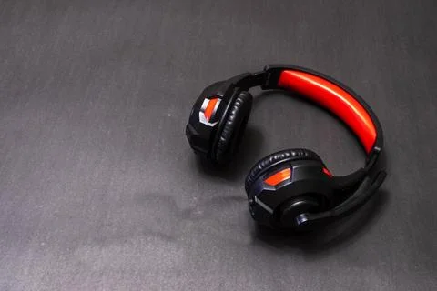 Wireless Over-Ear full size Headphones, Black leather isolated on black Stock Photos
