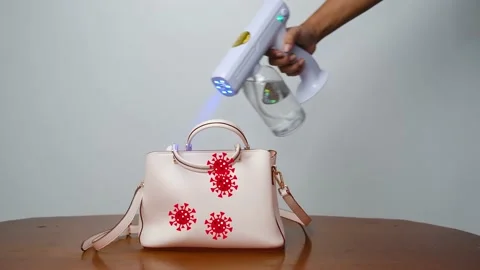 Wireless rechargeable nano blue ray atomizer spray gun Stock Footage 158857567