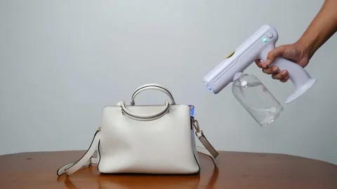 Wireless rechargeable nano blue ray atomizer spray gun Stock Footage 158857579