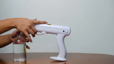 Wireless rechargeable nano blue ray atomizer spray gun Stock-Footage 158865629
