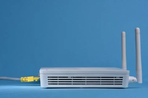 Wireless router network with network cable Stock Photos