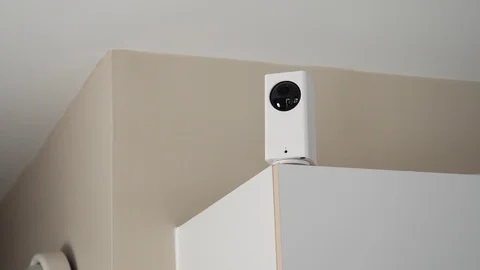 Wireless Security Camera at Home Moving Filming Around 스톡 동영상 122112545