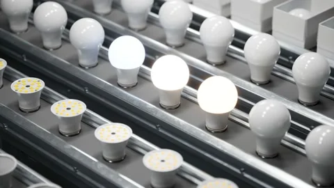 Wireless smart lightbulbs factory. Many electronics on a production line. Loop Stock Footage 202282039