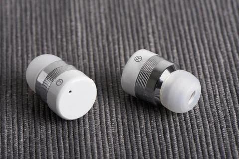 Wireless stereo earbuds Stock Photos
